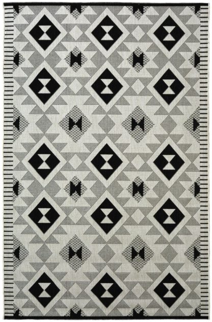 8445bcd59a372eeb585c23ce13eb0e9eb2559db5c1b738fb42c6bce66f120155.jpg An Image of Homemaker Indoor Outdoor Geo Mono Rug - 80x150cm - Black