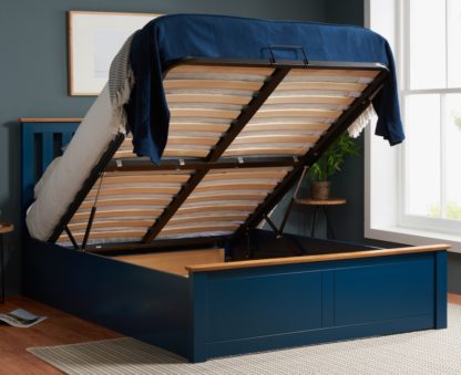 An Image of Phoenix Navy Blue Wooden Ottoman Storage Bed Frame Only - 4ft6 Double