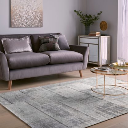 aefe73c7d68244bea9b0a2ca1223377b229e4d8bb70ffe3e8cfabc9fd7dfe751-1.jpg An Image of Prague Chenille Rug Prague Red