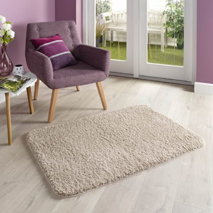 bf6f2e0f4620529710237b90382a507d3529df7581a8572c6f2a98c44f4b09e4.jpg An Image of Marvel Shaggy Washable Rug Cream