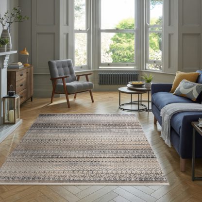 e02e1ebc3d0606fc189d83cfdc2490bf34f1d701b7d0aca776b95f9a66c9236c-1.jpg An Image of Parker Rug Blue, Brown and White