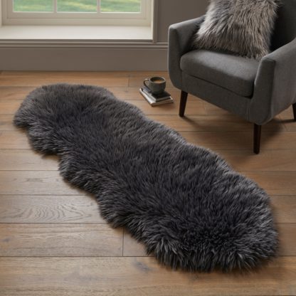 e14921f79347653812ed0be7ace70a564ac52b715412b0f60753aaf001cd478a.jpg An Image of Luxe Double Pelt Faux Sheepskin Rug Luxe Ivory