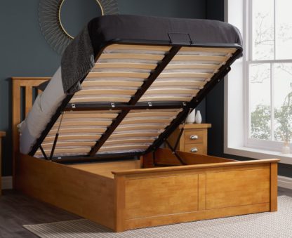 An Image of Phoenix Oak Finish Wooden Ottoman Storage Bed Frame - 5ft King Size