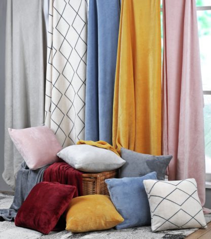 f79928aa3084059432f48761dad20a16c949aa81c49afe7ff064965a0f278953.jpg An Image of Argos Home Plain Super Soft Fleece Cushion - Stone - 43x43cm