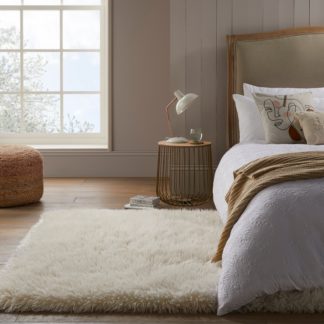 An Image of Luxe Faux Sheepskin Rug Luxe Ivory