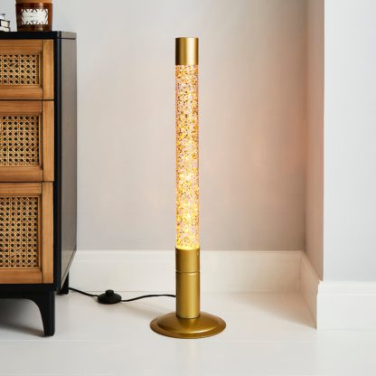 4d0a5ee8b54714c50314b51b5add58724ee263887554f05c6c8c536a67efc138.jpg An Image of Gold Glitter Floor Lamp Gold