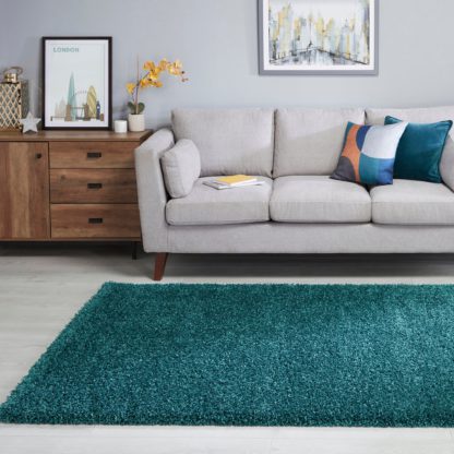 6cb9e20c599b3b63c2c1adb9cd3fe1c2a0e4a33e77677e112bb5ca3384ad952c-1.jpg An Image of Slumber Shaggy Rug Slumber Ochre