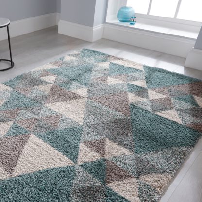 7adb2c38350316c0f84e4262ed97bd2cf3b6ba84a33a84f3a8cf0724eaafdbc6.jpg An Image of Nuru Berber Rug Nuru Blue Cream Grey