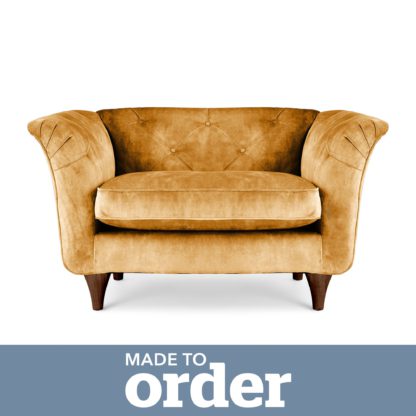 811b1f16f784da504575b6476b5ffb52ac4ca9fd305f7d958522fd24901721e8.jpg An Image of Jaipur Snuggle Chair Slub Velvet Green