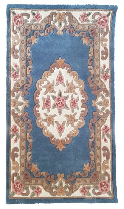 a817ed691889d938ea0fad881b0a239e99272486bb3e33040f3364ea06c232d3.jpg An Image of Origins Shensi Half Moon Rug - 67x127cm - Wine
