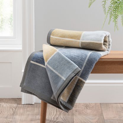 a2e156928d0407445f257b65aa1aaf795ae047589d5a9e886d93fcefeb87090c.jpg An Image of Super Soft Squares Throw Ochre