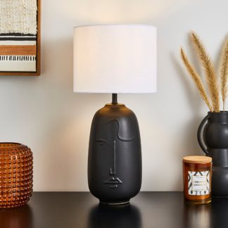An Image of Faces Table Lamp Black