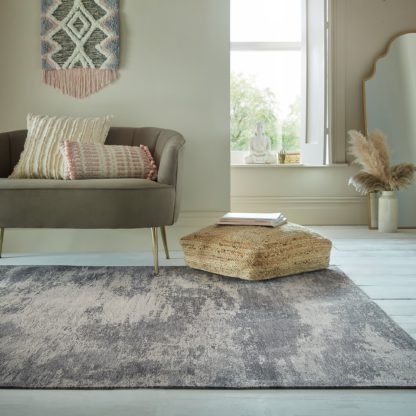 ecff3d1fc51f8e3fbec56f89c7d2a43f21faff2ca328f1f1ec687b8d6b98e380.jpg An Image of Irisa Abstract Rug Irisa Multi