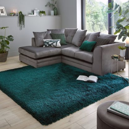1dd4766b8ed88db06d5f389fbdcf909f8940ff42f0b6fe2b791974d94c148baa.jpg An Image of Jewel Shaggy Square Rug Jewel Emerald (Green)