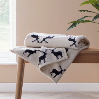 An Image of Stag Print Natural Throw Natural