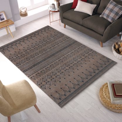 6b966f3969ca0847d5d3df165a7d99390efa3c6a724b2d70e8a862799abd7d1e.jpg An Image of Match Niko Jute Look Washable Rug Natural