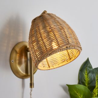 An Image of Churchgate Cotes Rattan Plug In Wall Light Brass