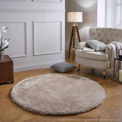 a664aa3b458060e65ac1b4118b00499b1db1a37341f70598ec2592f903e83bb1.jpg An Image of Indulgence Circle Shaggy Rug Natural