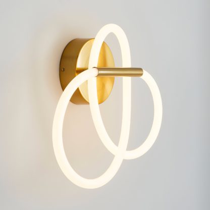 eb64ebc3dda8b5df3520957c96e35878adbeaf12183351a85871553e089658a5.jpg An Image of Flexi Integrated LED Wall Light 42cm Gold