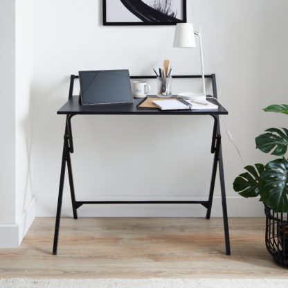 3acba13dd8deea770cf219493cff13a66dc83cfb7f50f755c10f5f96371335e1.jpg An Image of Evelyn Black Folding Desk Black