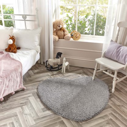 565db774329cde958b02f2b3f8ae3be02c95f564d95fbccac658c8af7310f720.jpg An Image of Marvel Shaggy Washable Heart Rug Marvel Shaggy Blush