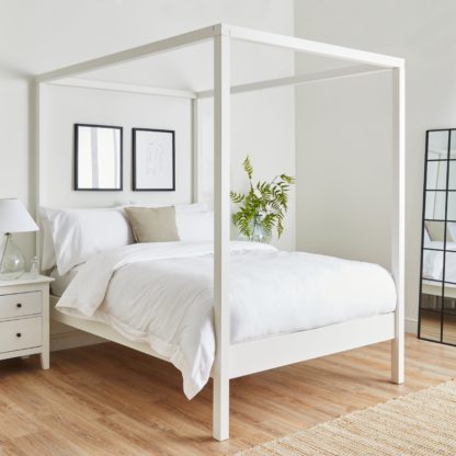 7b3f8a9061243464d22e060da2221bbeb6f24e16b2ca8b6512b712433d03d4c3.jpg An Image of Lynton 4 Poster Bed White