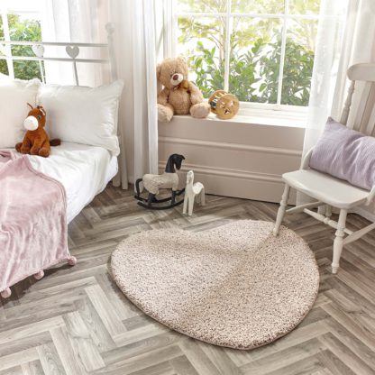 838e702e8f8af2d6a5b29d007c6944ed74983f93ab40529e5a334e144ed0c6ed.jpg An Image of Marvel Shaggy Washable Heart Rug Marvel Shaggy Blush