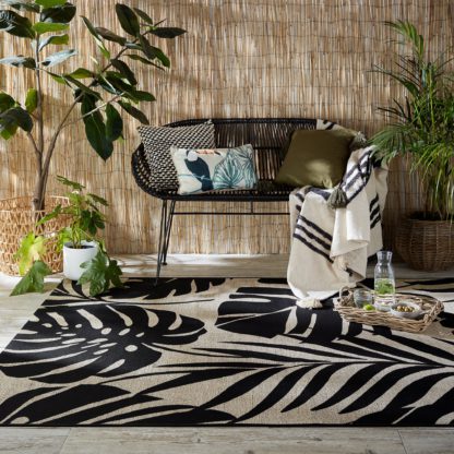 921d2d3ad47918b9df3d256da6a1429baa212affe002e4549da7592200dc787f.jpg An Image of Paradise Indoor Outdoor Rug Black