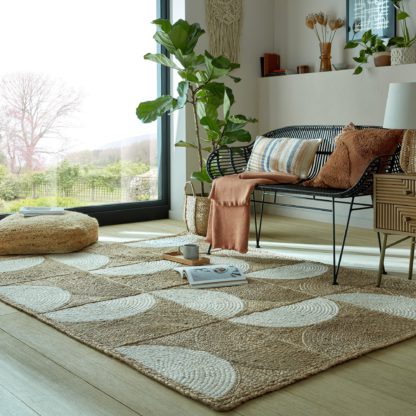 adade987796766f1dbf89bb5fffd185dc504a90a7c9eb4cc555084e103b6053c.jpg An Image of Curves Jute Rug Curves Jute Natural and White
