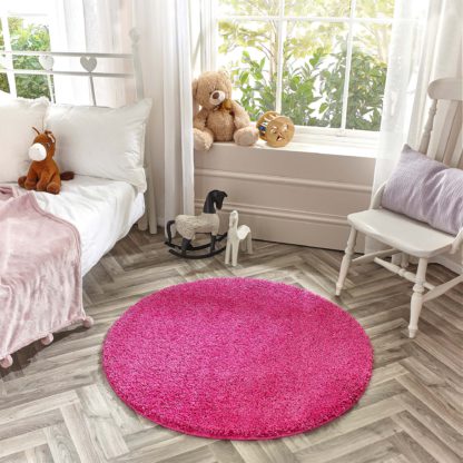 ce983cfaa540cfd076c694eeb64d3c8f313c7c1f2b9ad54d68d8f150f218a681.jpg An Image of Marvel Shaggy Washable Circle Rug Marvel Shaggy Navy