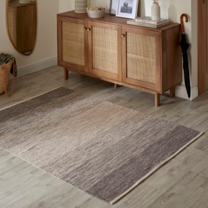 e8eea84ceca08ff9e7981c5ff3db9ce387820a63331428a2c27568cf71900f17.jpg An Image of Ombre Flat Weave Rug Ombre Flatweave Black