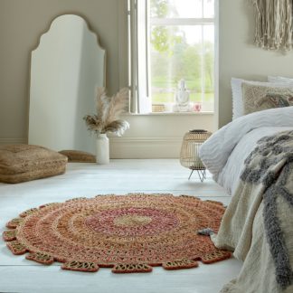 An Image of Elora Jute Circle Rug Elora Jute Natural and Pink