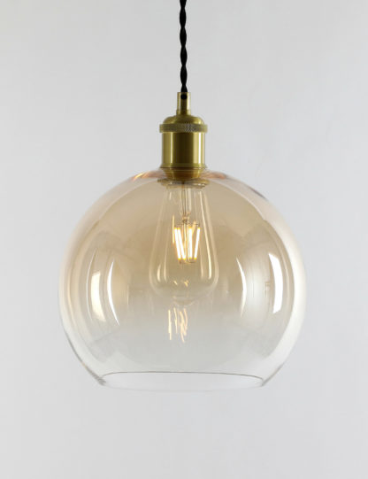 13dae931b395951f47737b5a0caf34c640ab7dd71c844ae71d98ddfc495b608b.jpg An Image of M&S Glass Metallic Ombre Shade