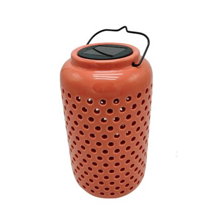 7e0746fe601d5b9af79d6d00bd69926459d958ed3b9234028791520b32adc13b.jpg An Image of Homebase Edit Solar Solar Ceramic Holey Lantern Coral