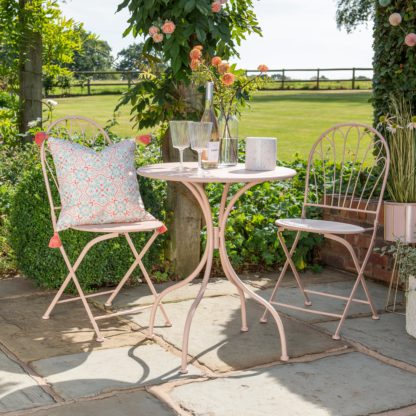 An Image of Scalloped Pink 2 Seater Metal Bistro Set Pink