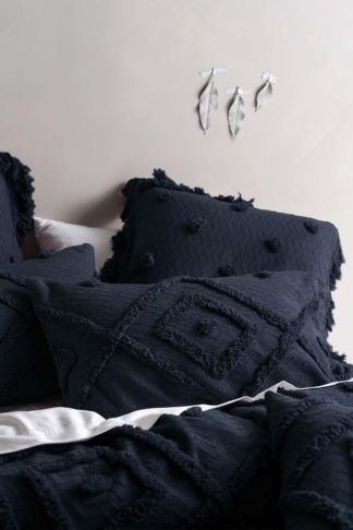 An Image of 'Adalyn' Aztec Tufted Pillowcase Set