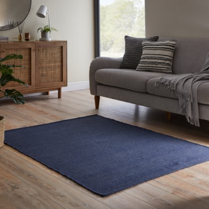 fbdef6a0e067788e59993209d7abf91446c412fa4e1e67e0fe9164510281faae.jpg An Image of Bodhi Rug Bodhi Emerald