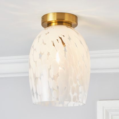 An Image of Lilo 1 Light Flush Ceiling Fitting Amber