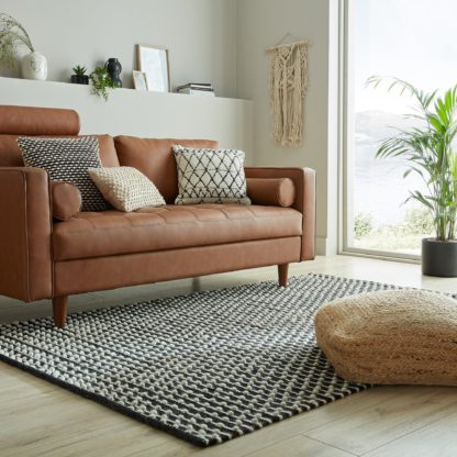 65a9d567fda86d688bd90044ccd142f73a3439fb34aad252f008ed3d3f3b2291.jpg An Image of Bobble Stripe Flatweave Rug Bobble Stripe Monochrome