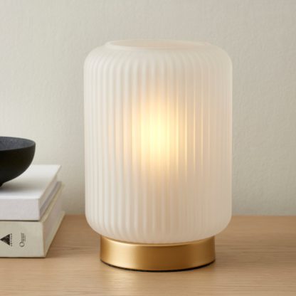 8bcf1b14da968a2d37ff7c754393a4fa907ff744c9f0eab9e2fa7ec625bcb51b.jpg An Image of Melody Pad Gold Table Lamp Gold