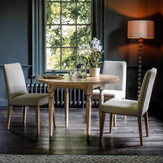 An Image of Chester Round Dining Table Natural