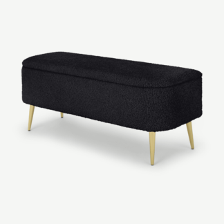 An Image of Abel Ottoman Storage Bench, Black Faux Sheepskin with Brass Legs