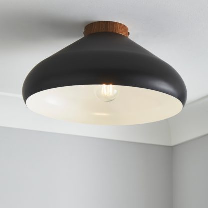 a978f0017196a1b8f0d72b5013575e2c0f25820ac8fdf04f42cc36f6bb5bac73.jpg An Image of Elements Wolston 1 Light Flush Ceiling Fitting Black