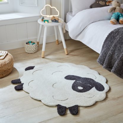 bb345d65b08895fb6bbb2befe002d32bb34fa1c3e0c27daabb2e8d4759884400.jpg An Image of Lana Lamb Rug Natural