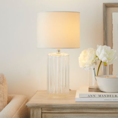 bef8b8e18c44ec36e28331732d08eea8b11483623a0d3204cfadef09420fd357.jpg An Image of Christine Ribbed Glass Table Lamp Smoke (Grey)