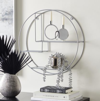 c6ec58f290e667a9b5f65b303780a6976a983507fb97a1662909307eeeb1b065.jpg An Image of Circle Shelf Silver Glass Silver