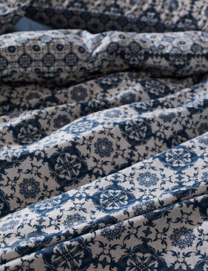 f7cc562fb6611c5e4690fe7e56825692b2b74799f95f954a7bf30dbf86066553-1.jpg An Image of M&S X Fired Earth Paris Isabelle Reversible Bedding Set