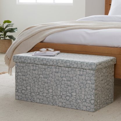 An Image of Foldable Storage Ottoman Black