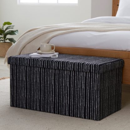 An Image of Foldable Storage Ottoman Black