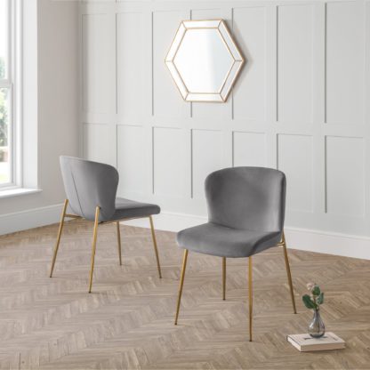 1116a79b5da1f6fd7f4c1d0297fb0a065da2fd76165868a88570f728e9777e98.jpg An Image of Harper Set of 2 Dining Chairs Pink